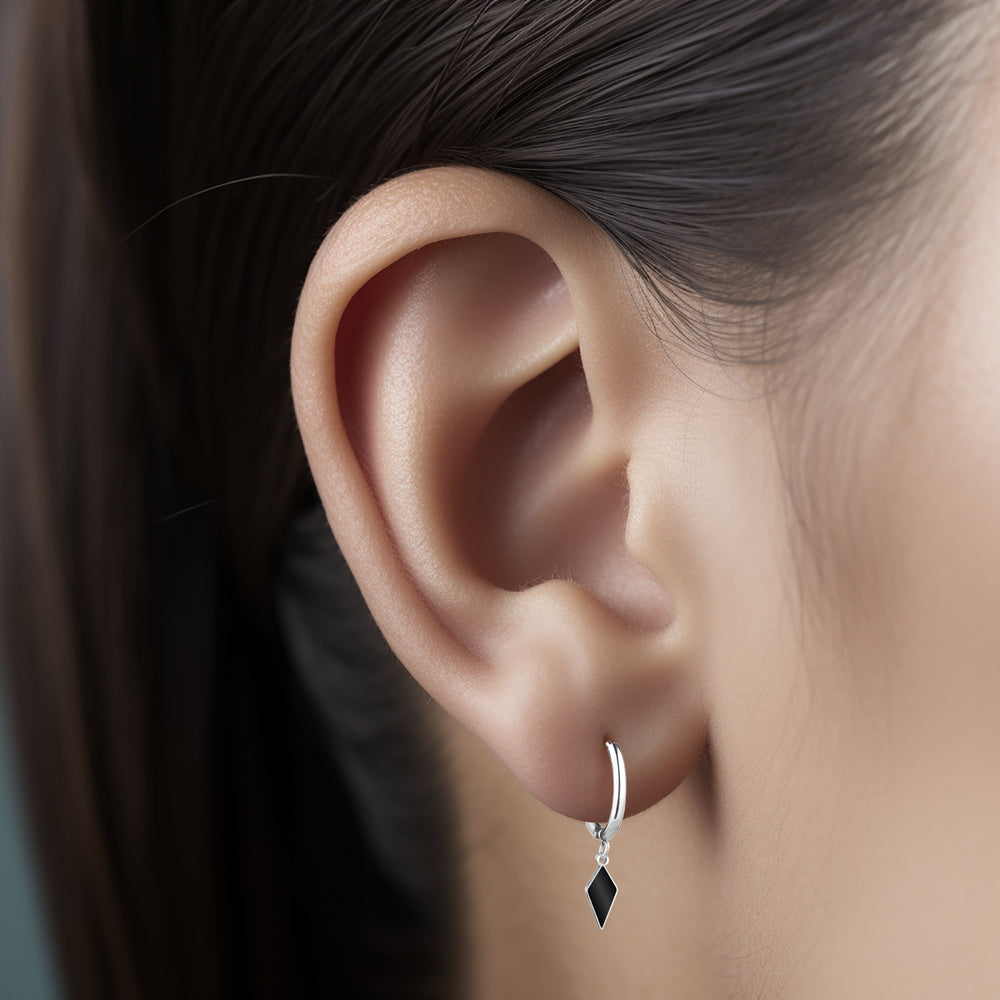 Steel hoop earring with kite and black enamel