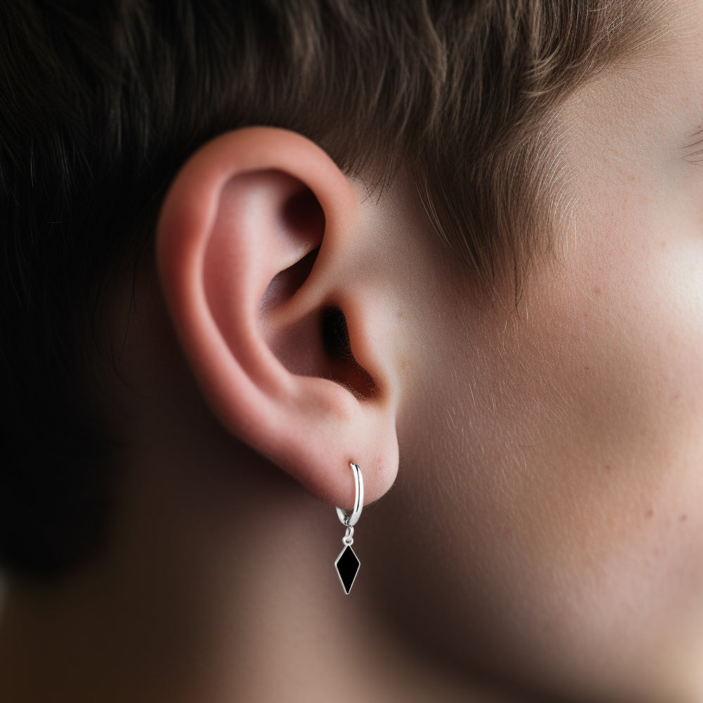 Steel hoop earring with kite and black enamel