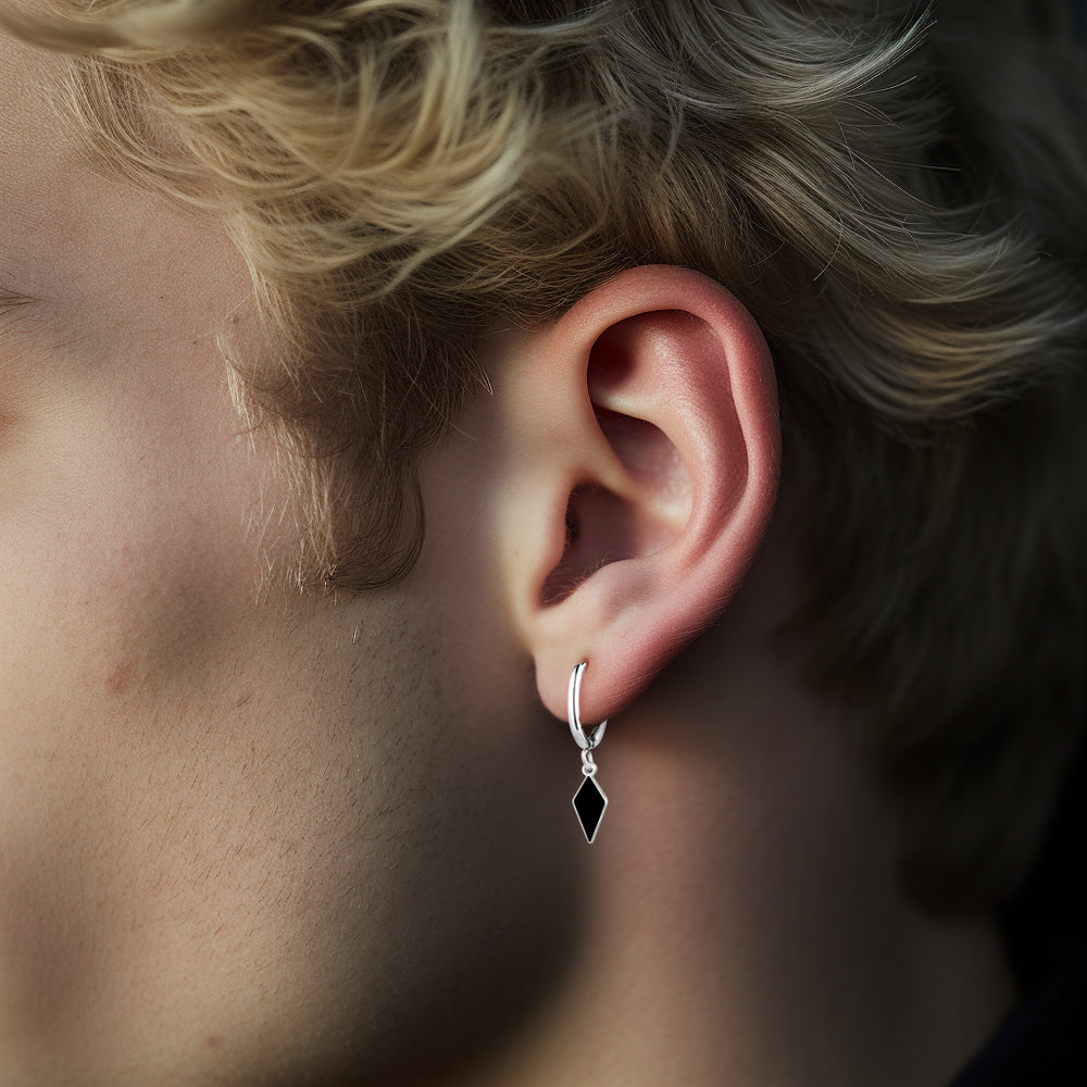 Steel hoop earring with kite and black enamel