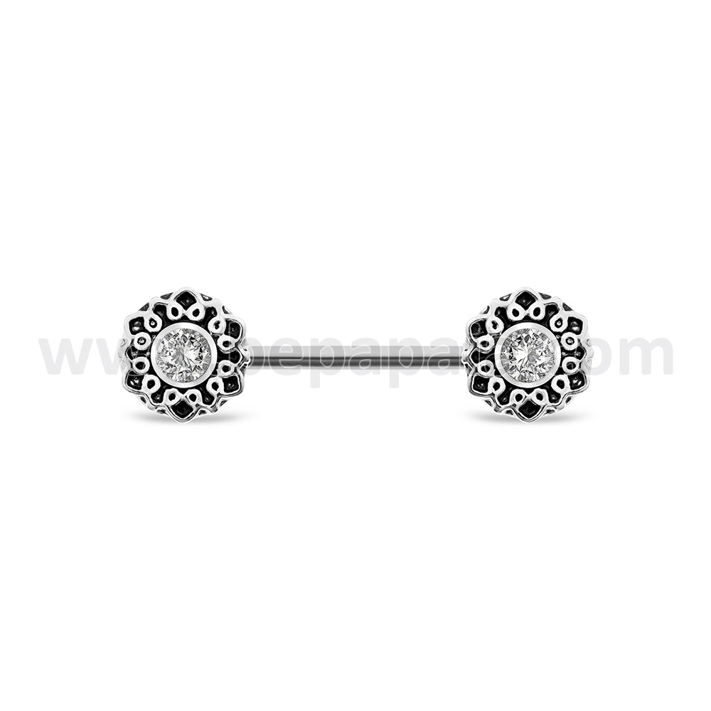 Surgical steel nipple piercing with ethnic designs