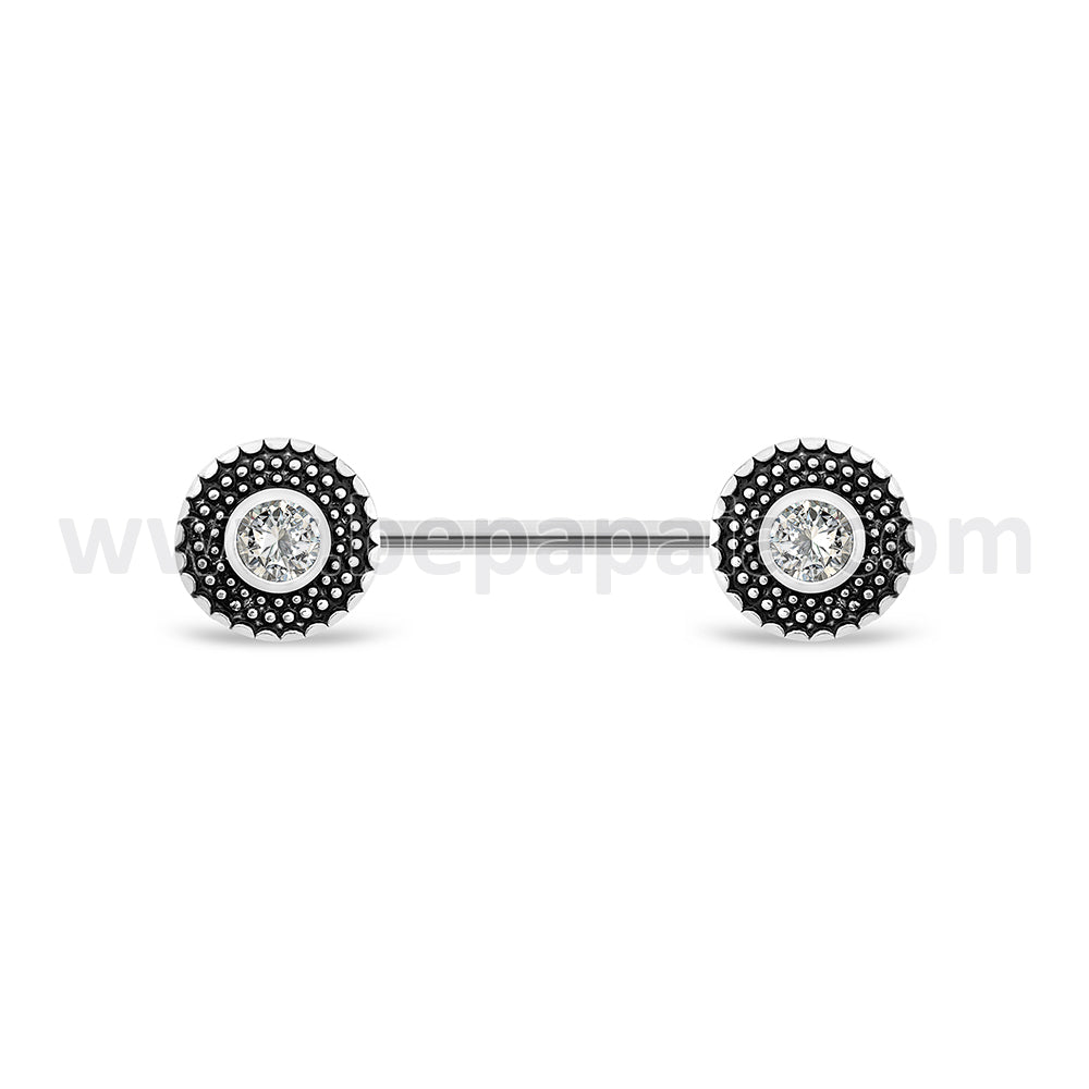 Surgical steel nipple piercing with ethnic designs