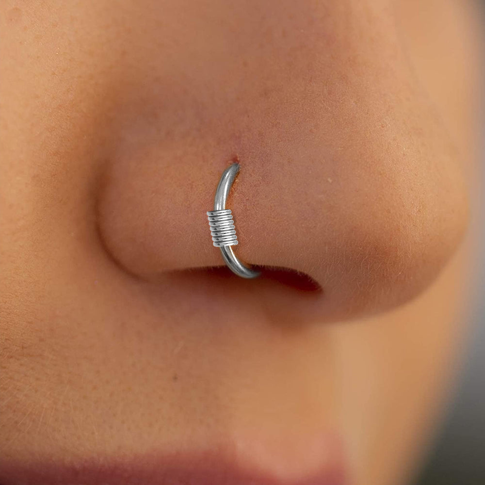 Surgical steel flexible nose ring with wire closing