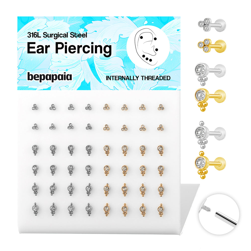 Bright piercing tragus and balls